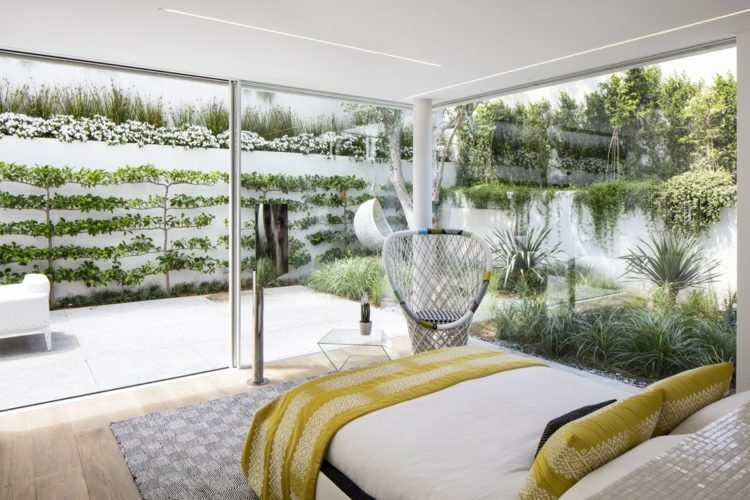 تصميمات الحائط-أفكار-غرف نوم-سرير-سقف-لهجات صفراء