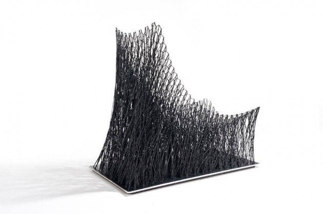 تصميم-كرسي-صنع-باليد-مضفر-ألياف الكربون