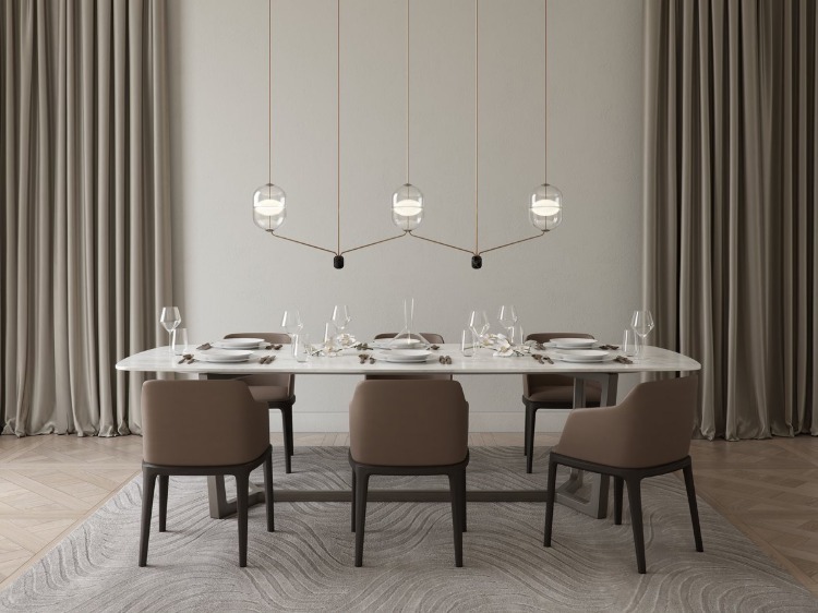 مصباح معلق بحنين إلى الماضي وفي نفس الوقت بتصميم حديث من الدنمارك ، ويتم وضعه بأناقة فوق طاولة طعام في غرفة المعيشة