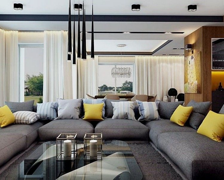 غرفة المعيشة الحديثة أريكة-رمادي-أصفر-الوسائد-الزجاج-طاولة القهوة-الأسود-أضواء قلادة