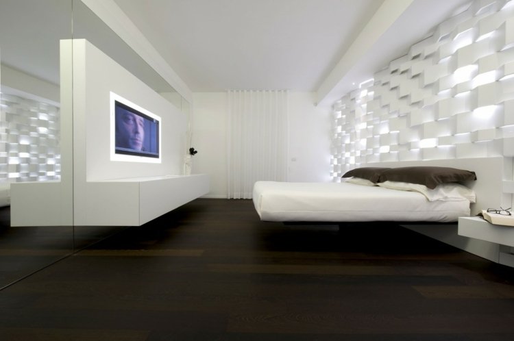 إضاءة غير مباشرة-غرفة نوم-جدار-نقش-أبيض-سرير-أرضية خشبية