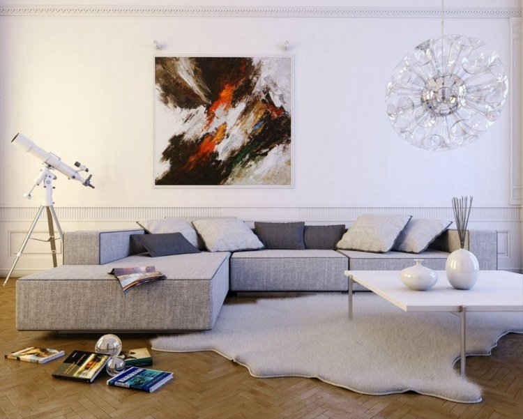 غرفة معيشة صغيرة أريكة كبيرة سجادة رمادية صور الحائط