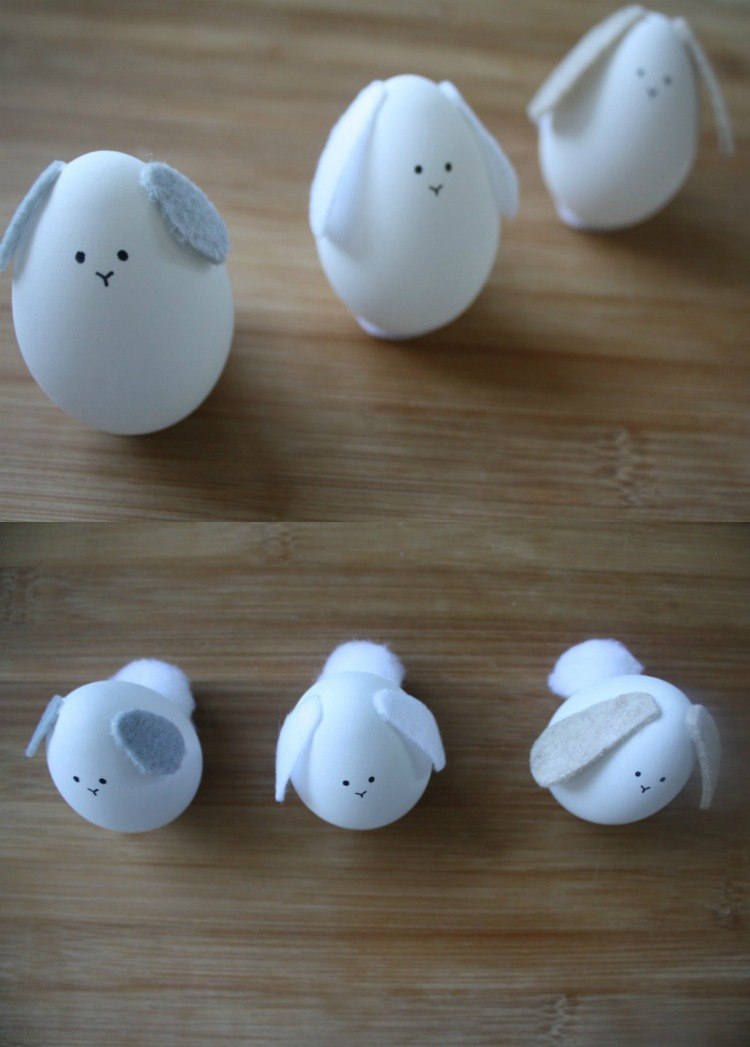 مضحك-بيض-عيد الفصح-تصميم-أرانب-آذان-بيضاء-الكريات