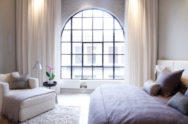 غرفة النوم تصميم نافذة مقوسة سرير أريكة منطقة القراءة تصميم السجاد