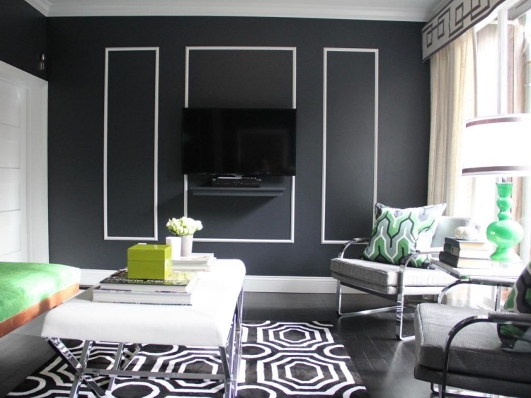 تصميم حائط-أسود-أبيض-سجادة-نمط-كرسي بذراعين-تنجيد-رمادي-طاولة تلفزيون