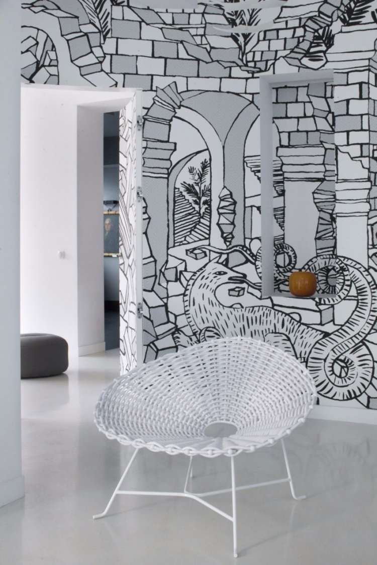 تصميم حائط-أسود-أبيض-كرسي بذراعين-عمل خوص-زخرفة-رسم-طلاء-حائط-حديث