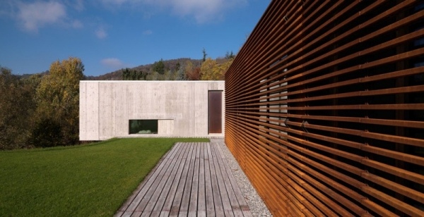منزل مواد بناء خشبية خرسانية تصميم خارجي عصري إيطالي