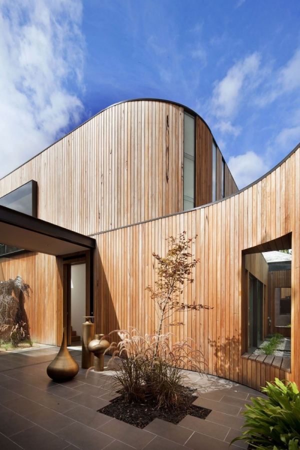 العمارة الحديثة منزل خشبي واجهة البيوت