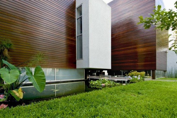 منزل خشبي من الخرسانة الخضراء
