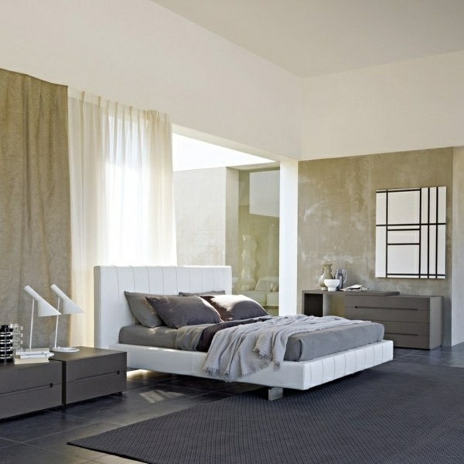 غرفة نوم حديثة معدة باللون الرمادي والأبيض