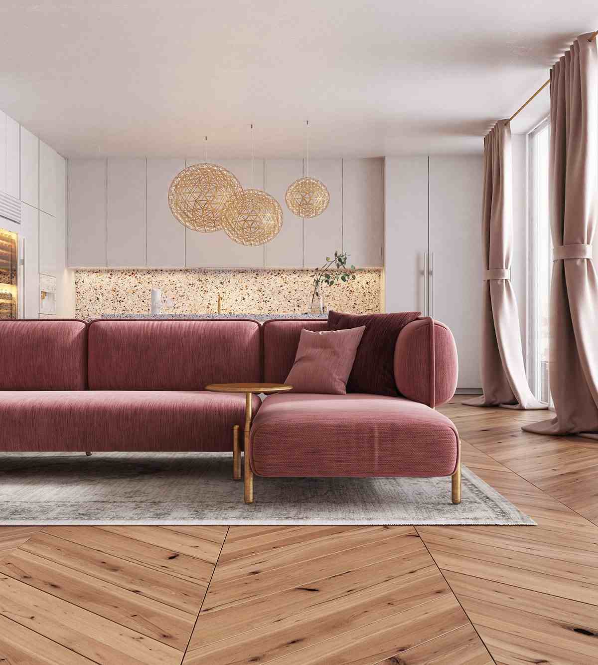 تجمع الأريكة الوردية في طراز السبعينيات مع المطبخ الحديث والجدار الخلفي للمطبخ المصنوع من مادة التيرازو