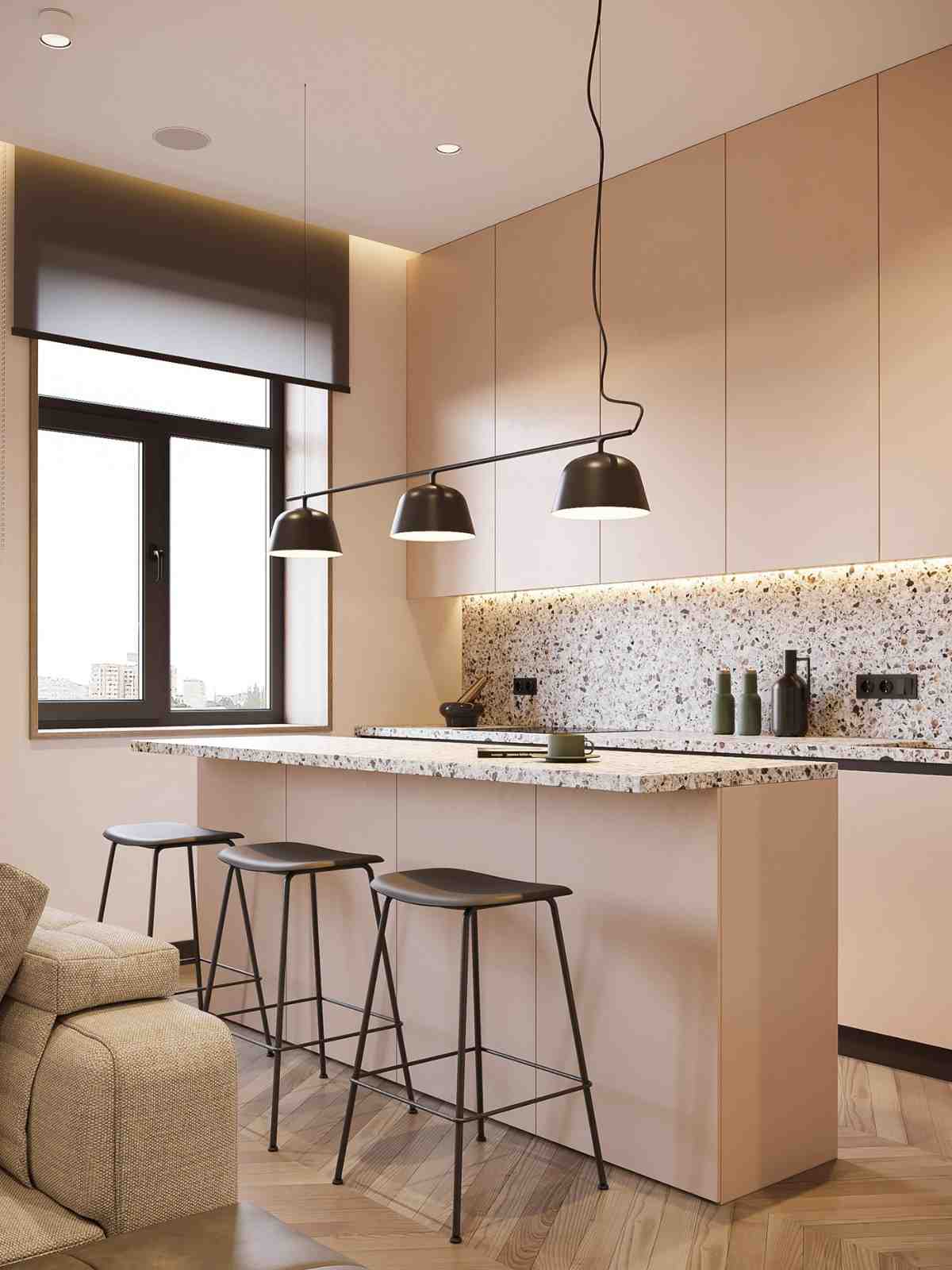 appertmen التصميم مع مطبخ صغير يتكون من جزيرة مطبخ مع أضواء قلادة سوداء ومقاعد بار