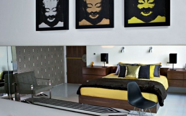 غرفة نوم-ريترو-حديث-نمط-خشب-سرير-جدار-فن-صور-بوذا-أصفر