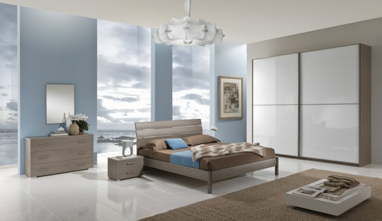 لون الحائط-مسحوق-أزرق-غرفة نوم-فاتح-خشب-سرير-خزانة ذات أدراج-خزانة ملابس-أبيض-مصباح أرضي معلق