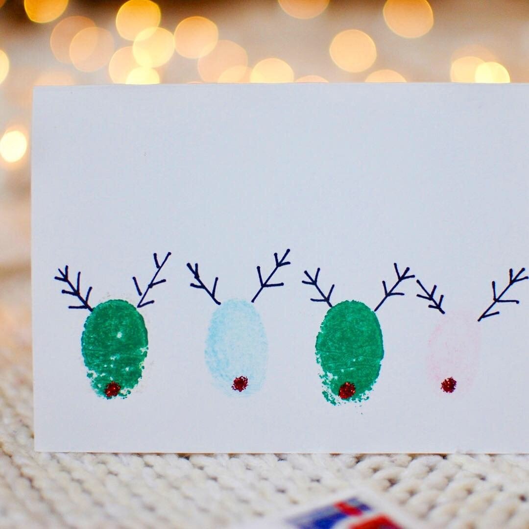 اصنع بطاقة عيد الميلاد ببصمات الأصابع وأفكار DIY مع الأطفال وكيفية رسم رودولف الرنة